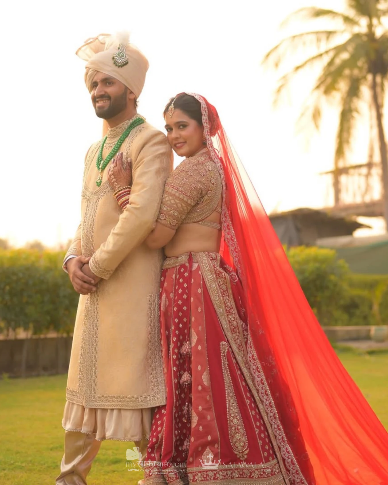Classic groom pagdi styled with a red ceremonial stole for Fatehgunj